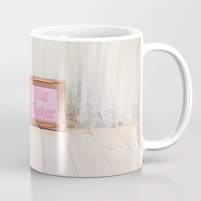 Empty bright interior with copy space and frame with text Coffee Mug