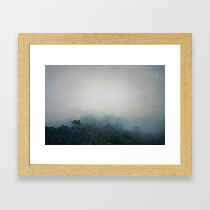 The misty woods Framed Art Print