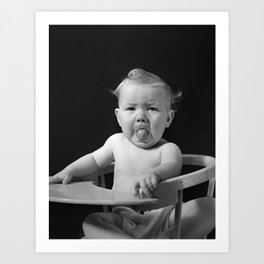 Terrible twos mad baby sticking his tongue out in high chair vintage humorous black and white photograph - photography - photographs Art Print