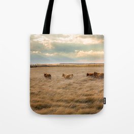 Cows Among the Grass - Cattle Wade Through a Field in Texas Tote Bag