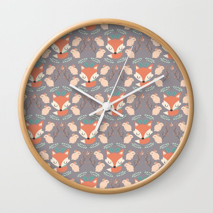 Foxes and rabbits Wall Clock