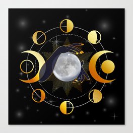 Full moon with triple goddess symbol in hands of a woman Canvas Print