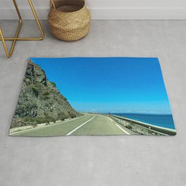 Serpentine coastal road next to the Rif mountains in North Morocco Rug
