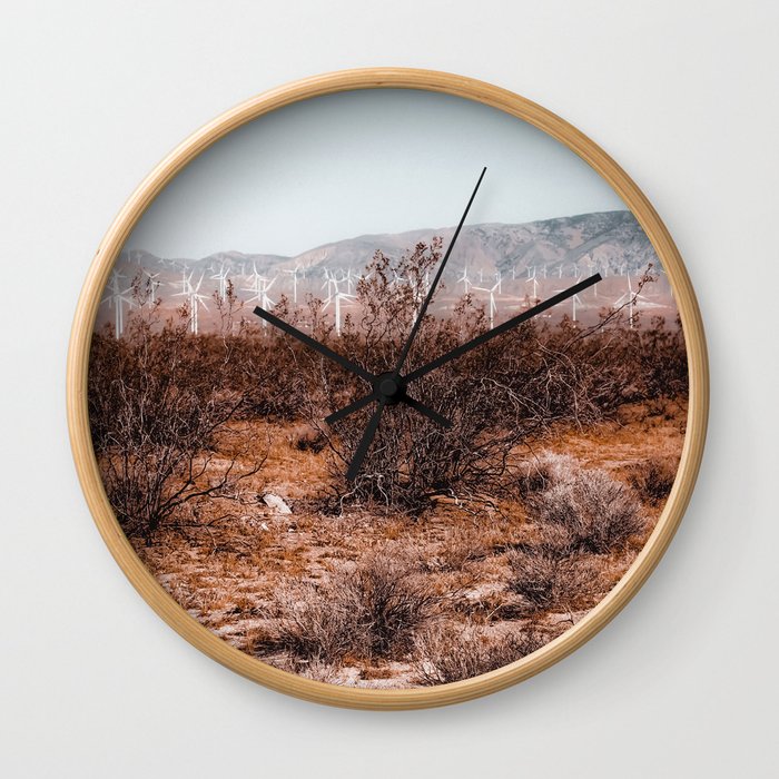 Desert and wind turbine with mountain view at Kern County California USA Wall Clock