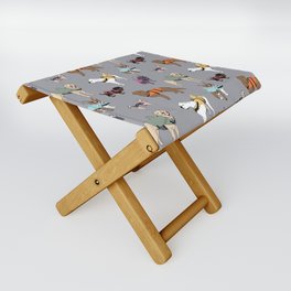 Dog Sharks (dogs in shark life-jackets) on grey Folding Stool