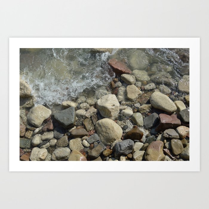 Multicolored pebble shore sweeped by waves. Art Print