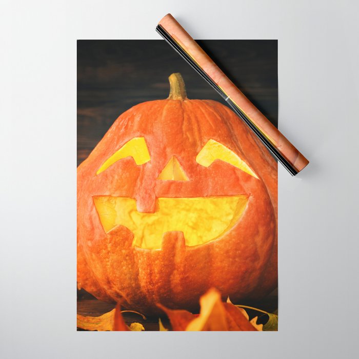 Halloween Pumpkin with Leaves on Wooden Background Wrapping Paper