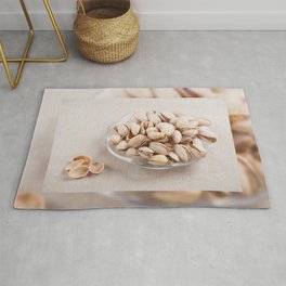 open pistachio nuts in shell Rug
