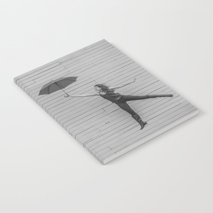 On the way to the break of day; woman flying with umbrella confidence inspirational female black and white photograph - photography - photographs Notebook