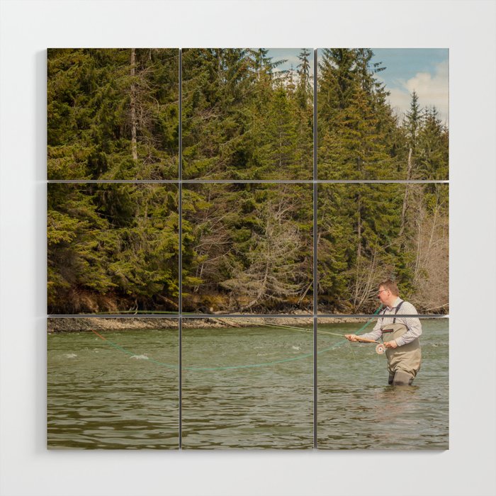 Close up of a fisherman spey casting on a river in British Columbia, Canada, in the spring Wood Wall Art