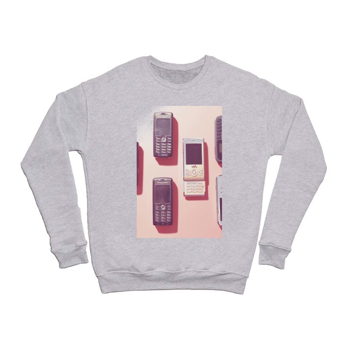 02_Hand phone in pink Crewneck Sweatshirt