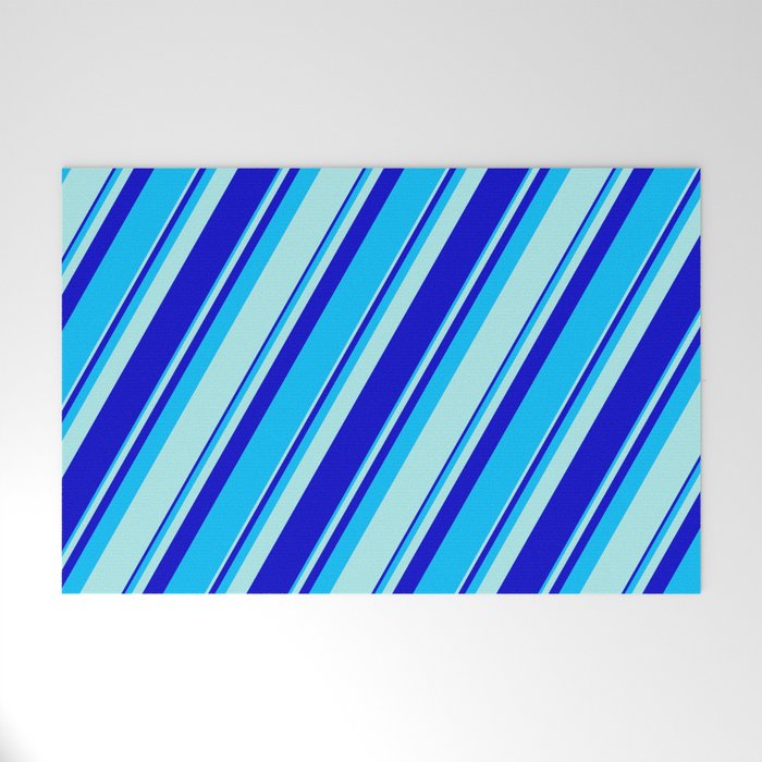 Turquoise, Blue, and Deep Sky Blue Colored Pattern of Stripes Welcome Mat