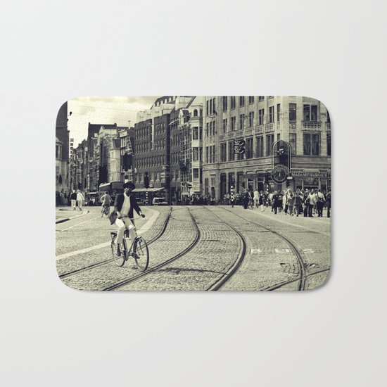 Cyclist over railway Bath Mat