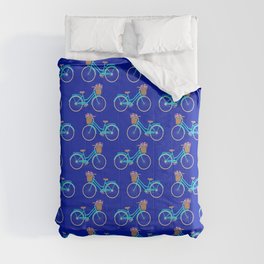 Bicycle with flower basket on blue Comforter