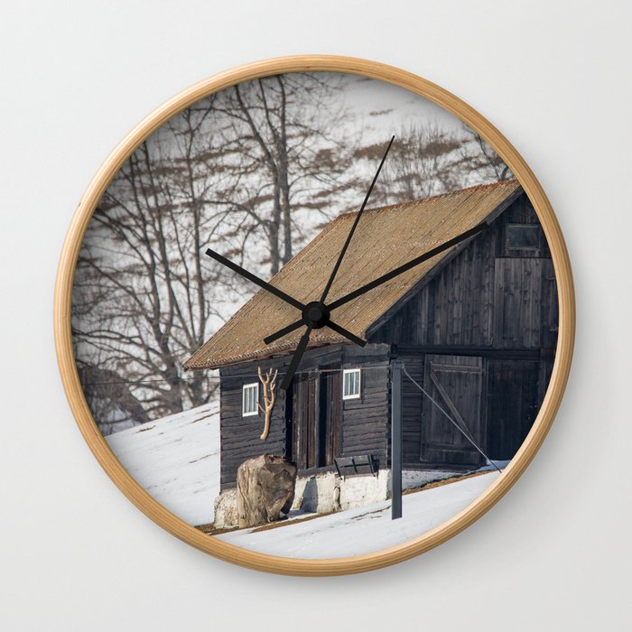 Old mountain house with Carpathian mountains in the background Wall Clock