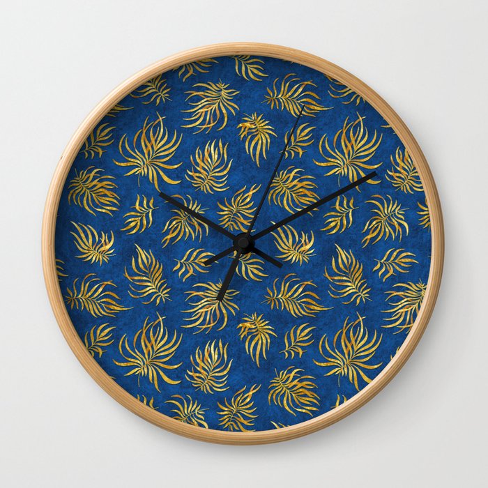 Gold leaves on dark texture background Wall Clock