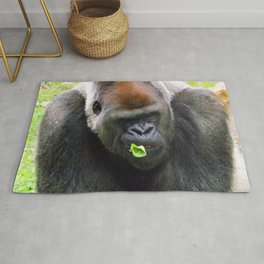 Male Silverback Lowland Gorilla with Smirk and Lettuce in Mouth Rug