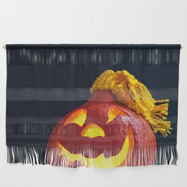Glowing Pumpkin with Autumn Leaves on a Dark Background. Jack's Lantern. Halloween Decoration Wall Hanging