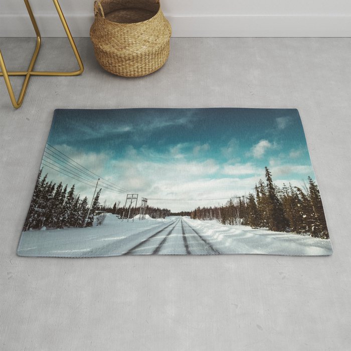 driving in lapland Rug