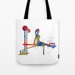 Woman practices gymnastics in watercolor Tote Bag