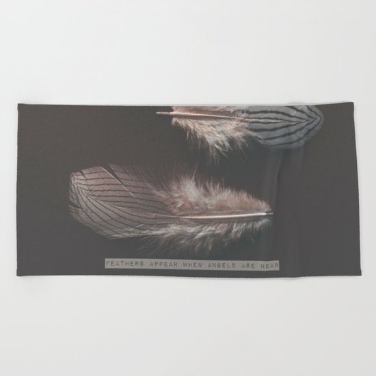 feathers appear when angels are near Beach Towel
