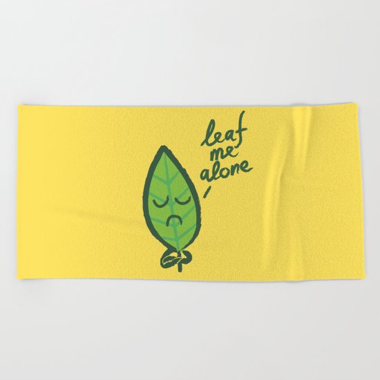 The introvert leaf Beach Towel