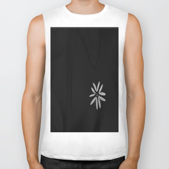 One Tiny White Flower on Black Background Biker Tank
