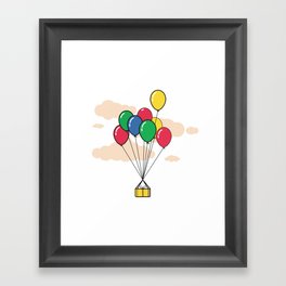 Gift box tied to balloons floating in the sky Framed Art Print