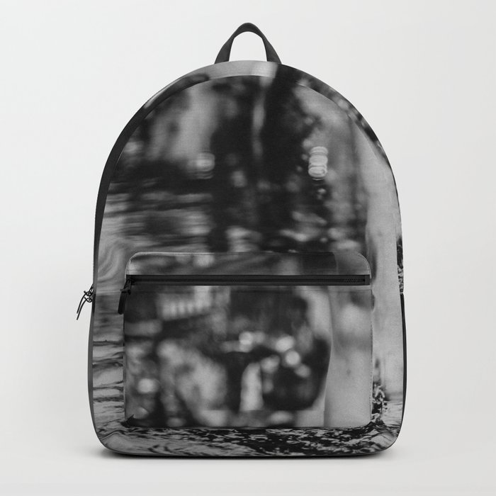 Walking ten feet off the ground female form over water portrait art black and white photograph / photography Backpack