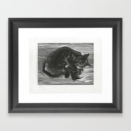 Cat with Voodoo Doll Framed Art Print