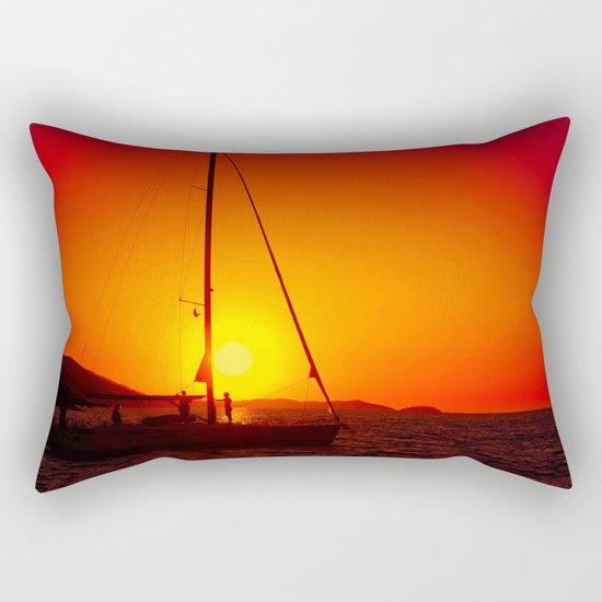 A sailboat at sunset Rectangular Pillow