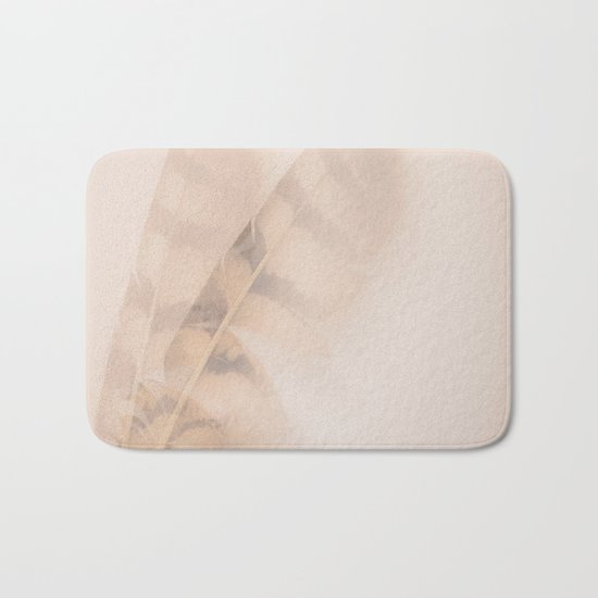 Two feathers on a soft pastel background - beautiful couple Bath Mat