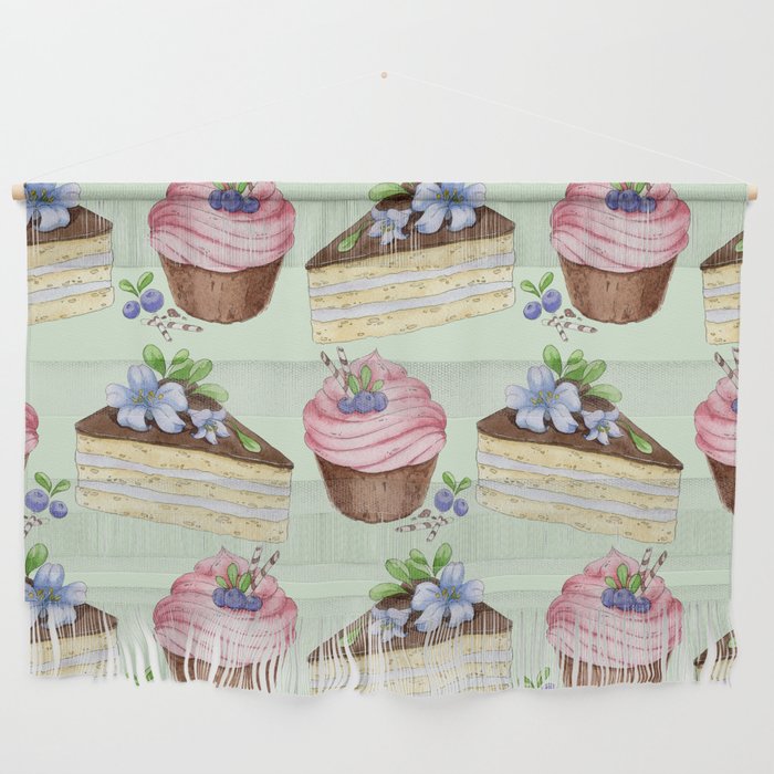 Watercolor texture with blueberries cupcakes and a piece of vanilla cake Wall Hanging
