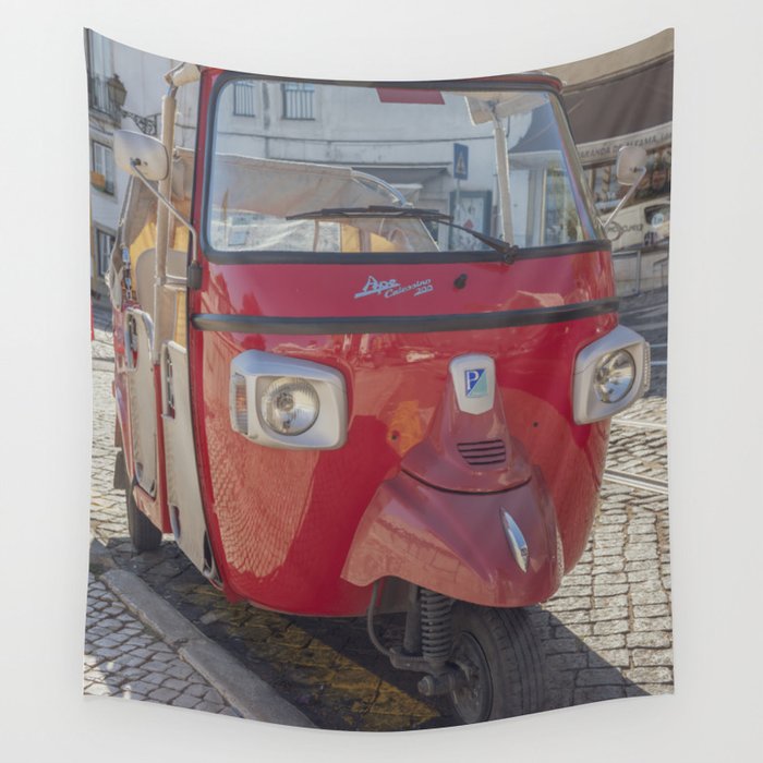 Vintage retro Ape tuktuk Lisbon, Portugal red moped in Portugal