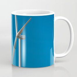 Wind turbine on the beautiful blue sky and on the tea field Coffee Mug
