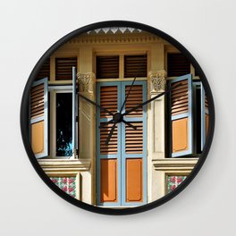 Traditional Singapore Peranakan or Straits Chinese shop house with decorative exterior and antique orange shutters in historic Geylang Wall Clock