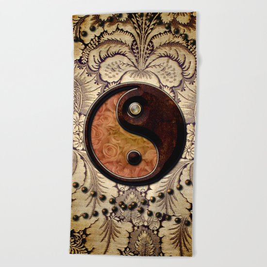 The sign ying and yang Beach Towel