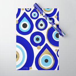 Evil Eye Charms on White Wrapping Paper