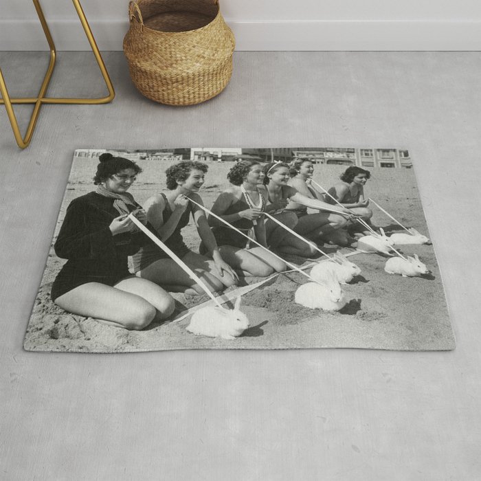 Women with pet bunnies on a leach vintage black and white female humorous portrait photograph - photography - photographs Rug