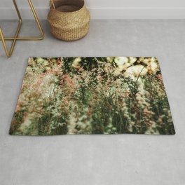 Flowers in the sun Rug