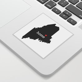 Maine home state - black state map with Home written in white serif text with a red heart. Sticker