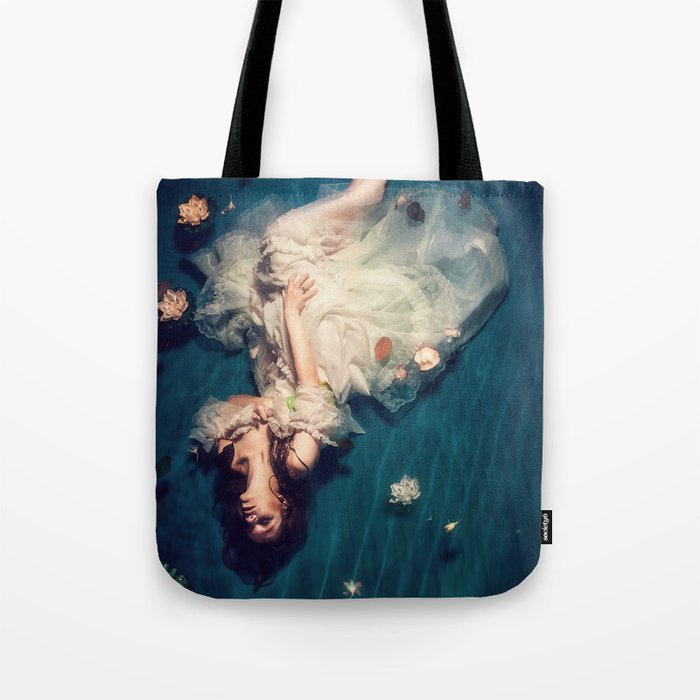 Dreamland and flowers in lily pond; female in white gown floating magical realism fantasy female portrait color photograph / photography Tote Bag