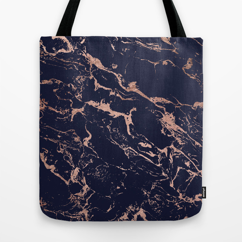 navy and rose gold bag