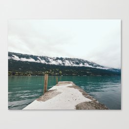 Peer to a cloudy lake, Switzerland | Landscape | Moody travel photography Canvas Print