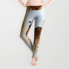 Corroded white metal background. Rusted white painted metal wall. Rusty metal background with streaks of rust. Rust stains. Rystycorrosion. Leggings