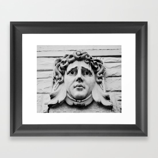 Face of stone Framed Art Print