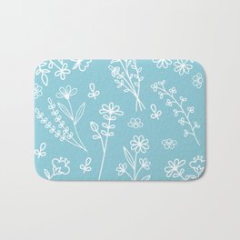 Teal with white flowers Bath Mat