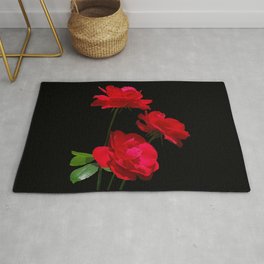 Red roses on black background Rug