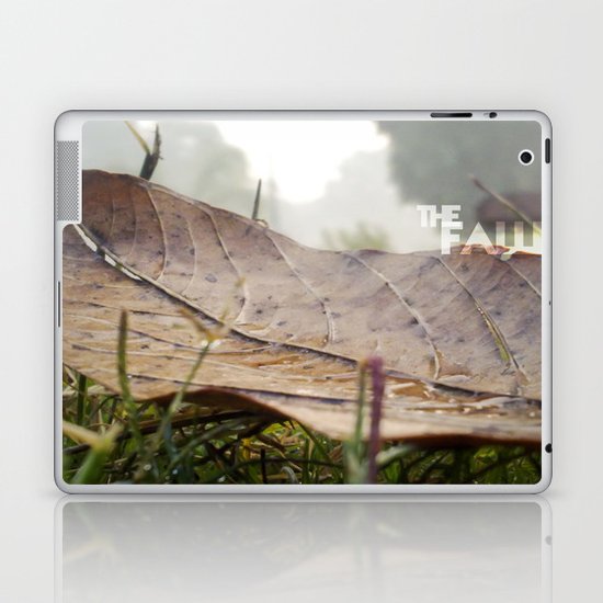 Dew drops on a fallen leaf Laptop & iPad Skin