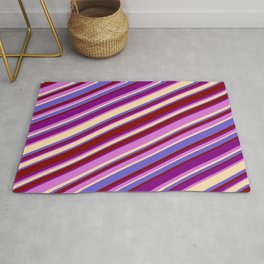 [ Thumbnail: Eyecatching Purple, Orchid, Tan, Slate Blue & Maroon Colored Lined Pattern Rug ]
